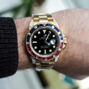 Alternative view of Rolex GMT-Master II 116758SARU 18K Yellow Gold Black Dial